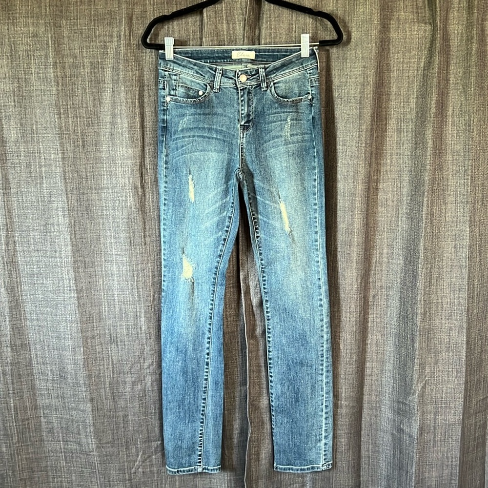 Elan straight leg jeans size small with light distressing